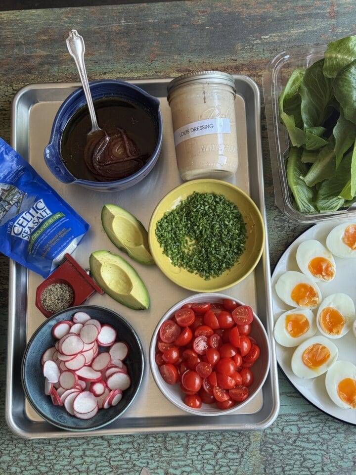 salad ingredients on a metal sheet try on a counter