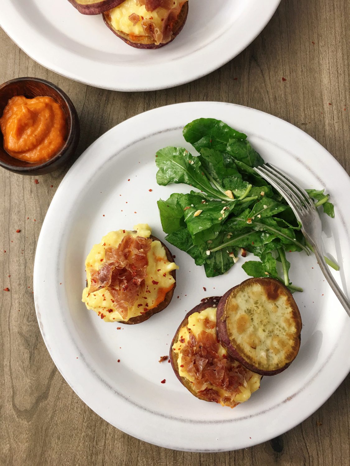 eggs on sweet potatoes with greens