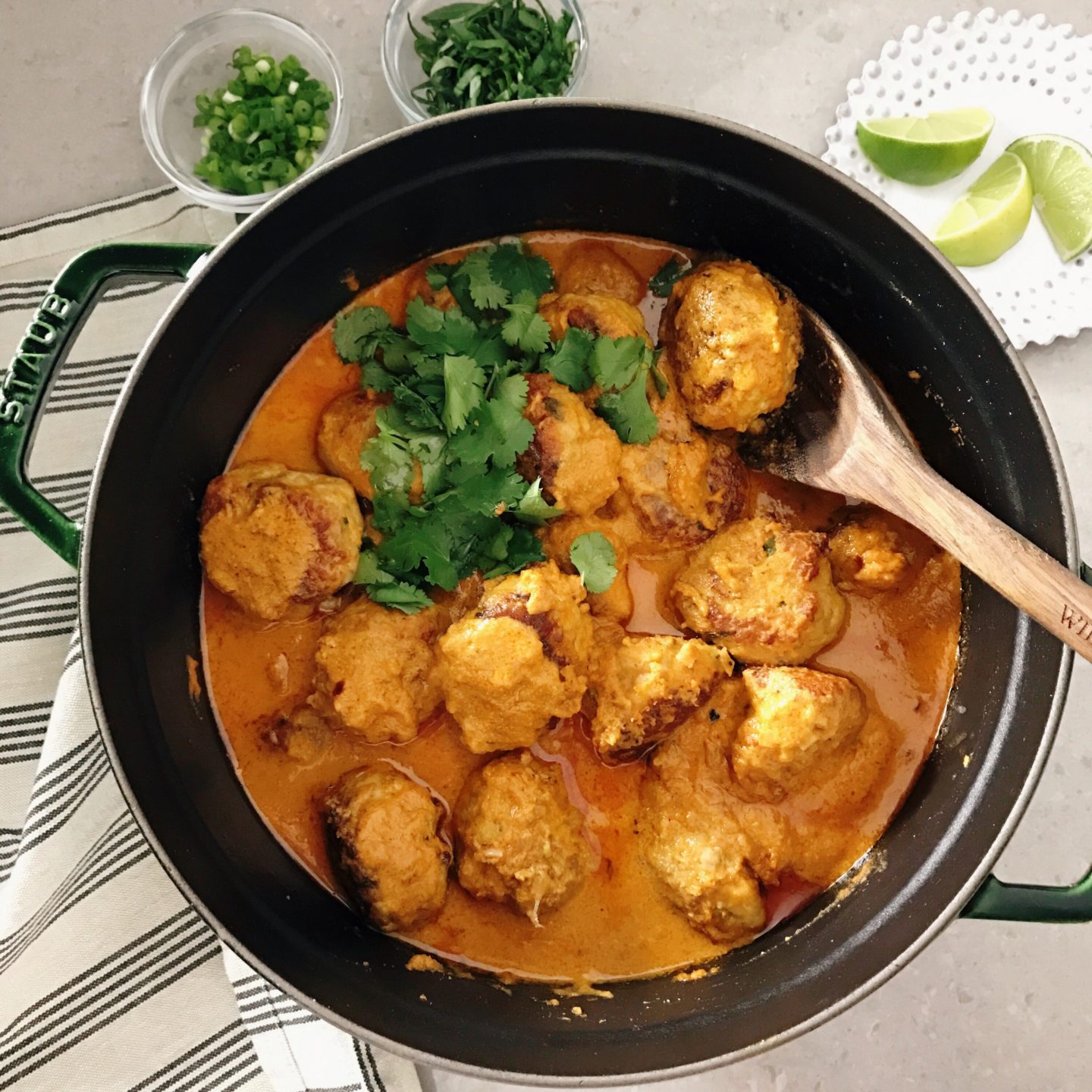 Chicken Meatballs in Red Curry in a large pan