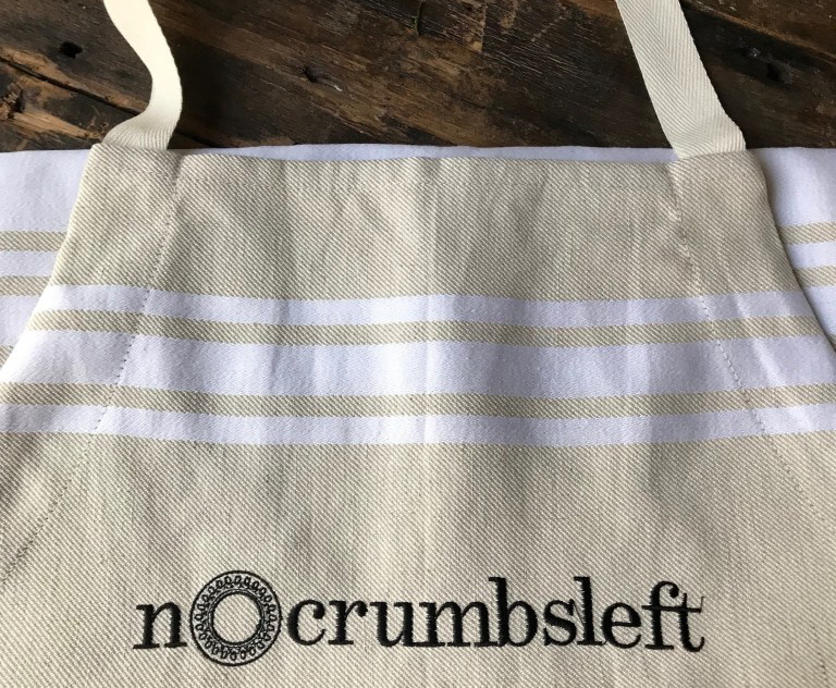 nocrumbsleft apron white