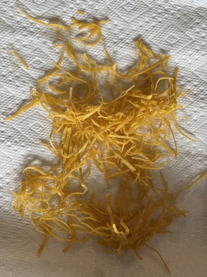 a photo of tortilla strips on a paper towel