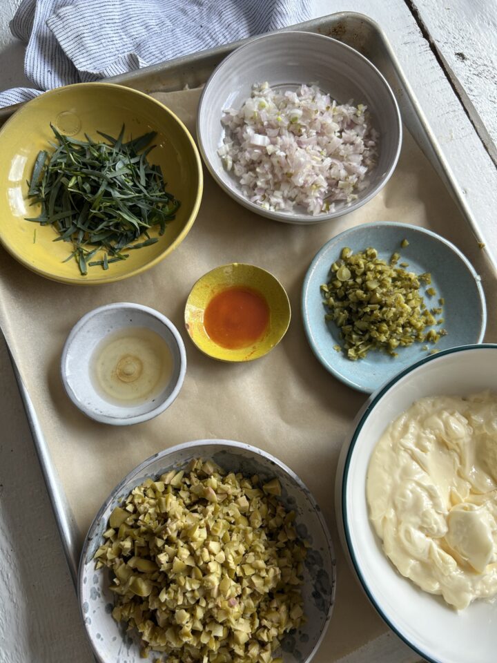 tartar sauce ingredients on a sheet pan 