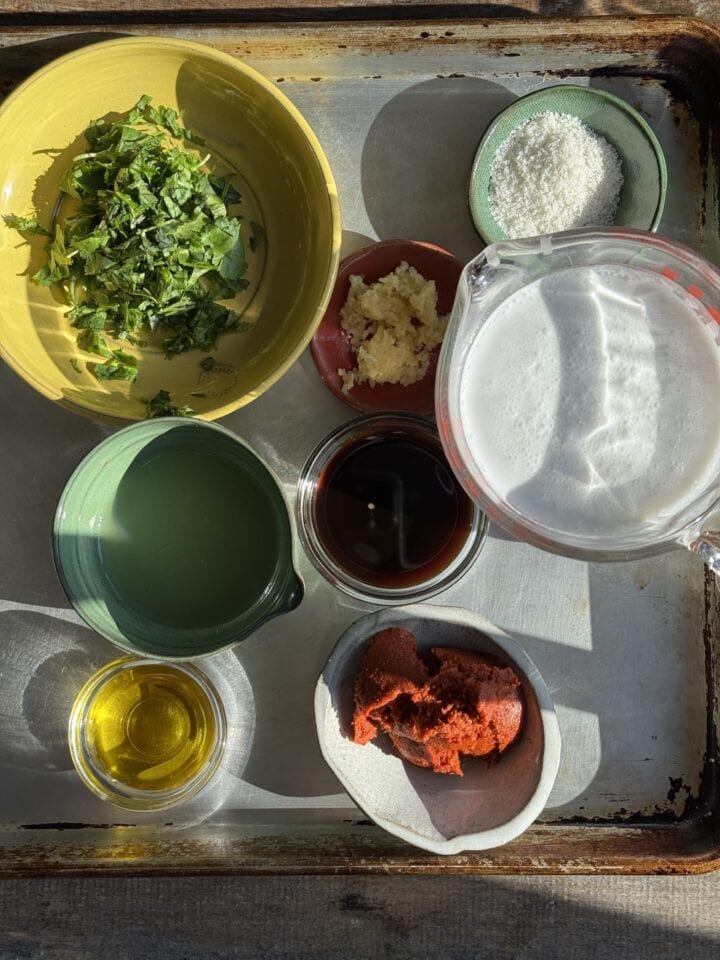 the ingredients for bangkok chicken marinade in small bowls