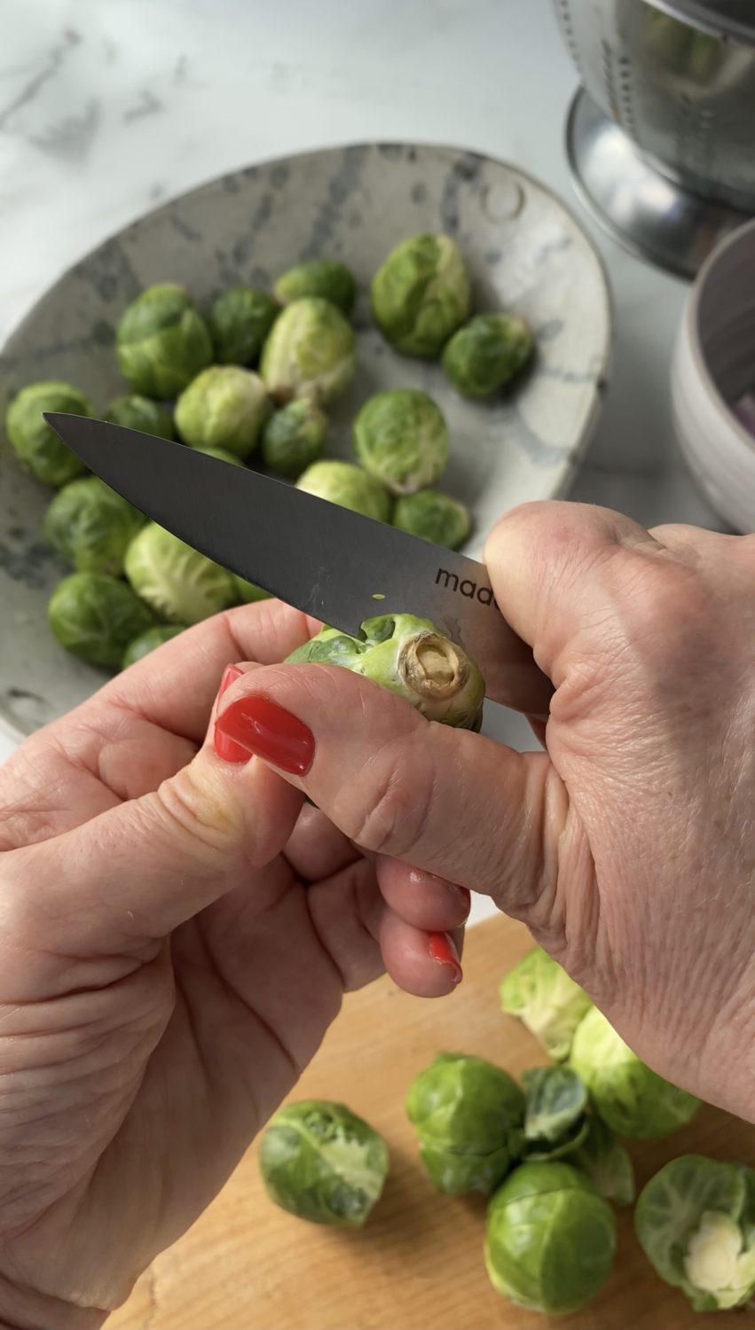 paring knife cutting brussels sprouts