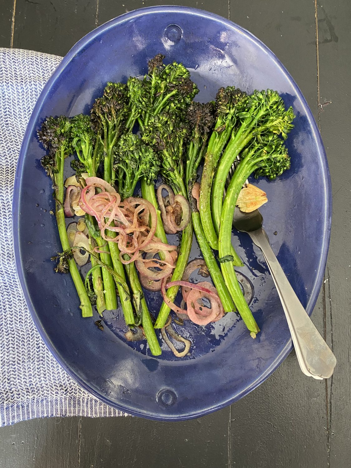 charred broccolini salad in a lucy platter