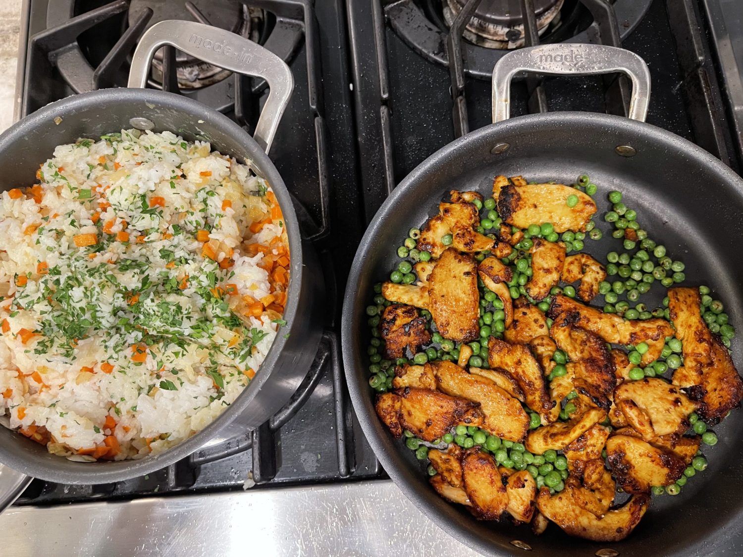 rice and chicken and peas in pans
