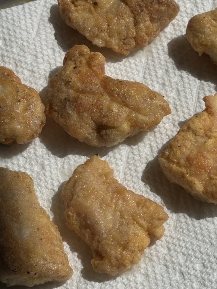 chicken bites on a paper towel