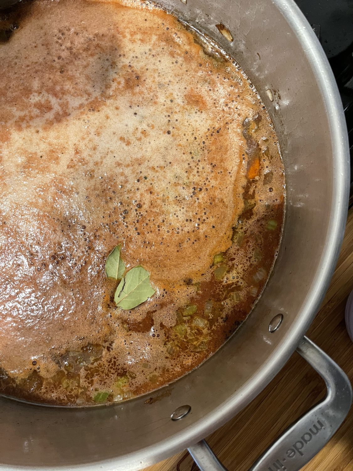 sauce in the pan with bay leaf