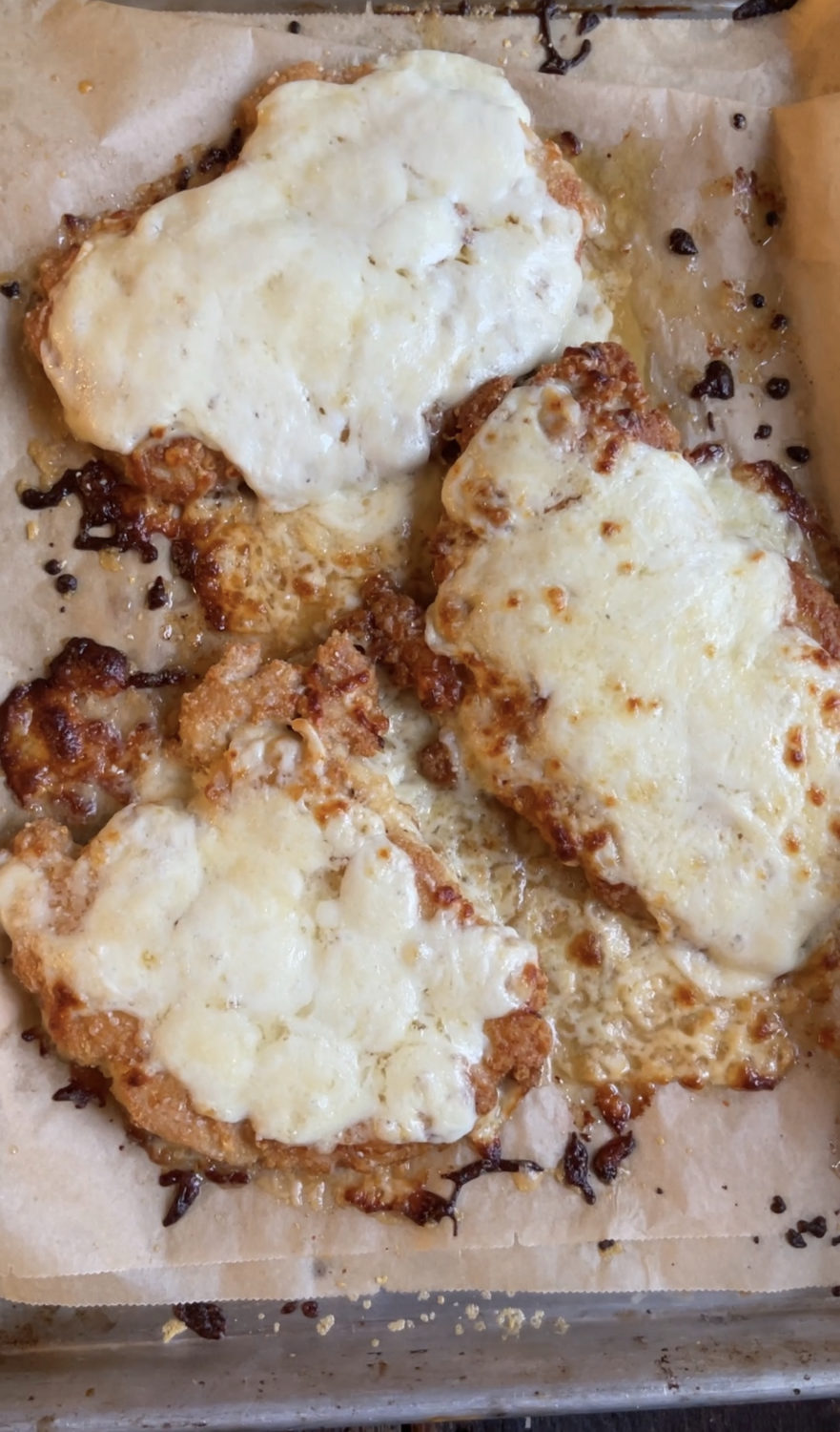 chicken parm on a baking sheet