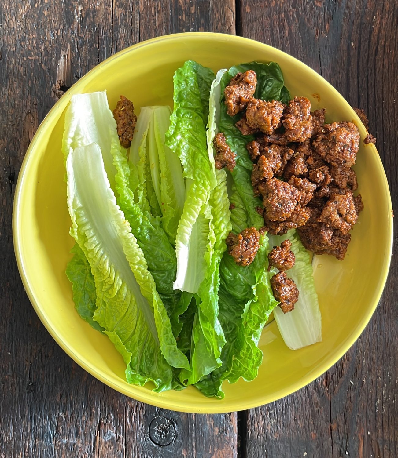 lettuce and ground beef in a bowl