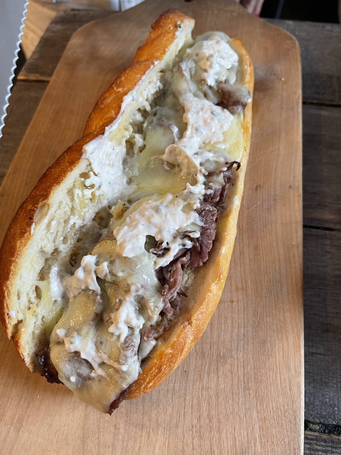 french dip on a cutting board