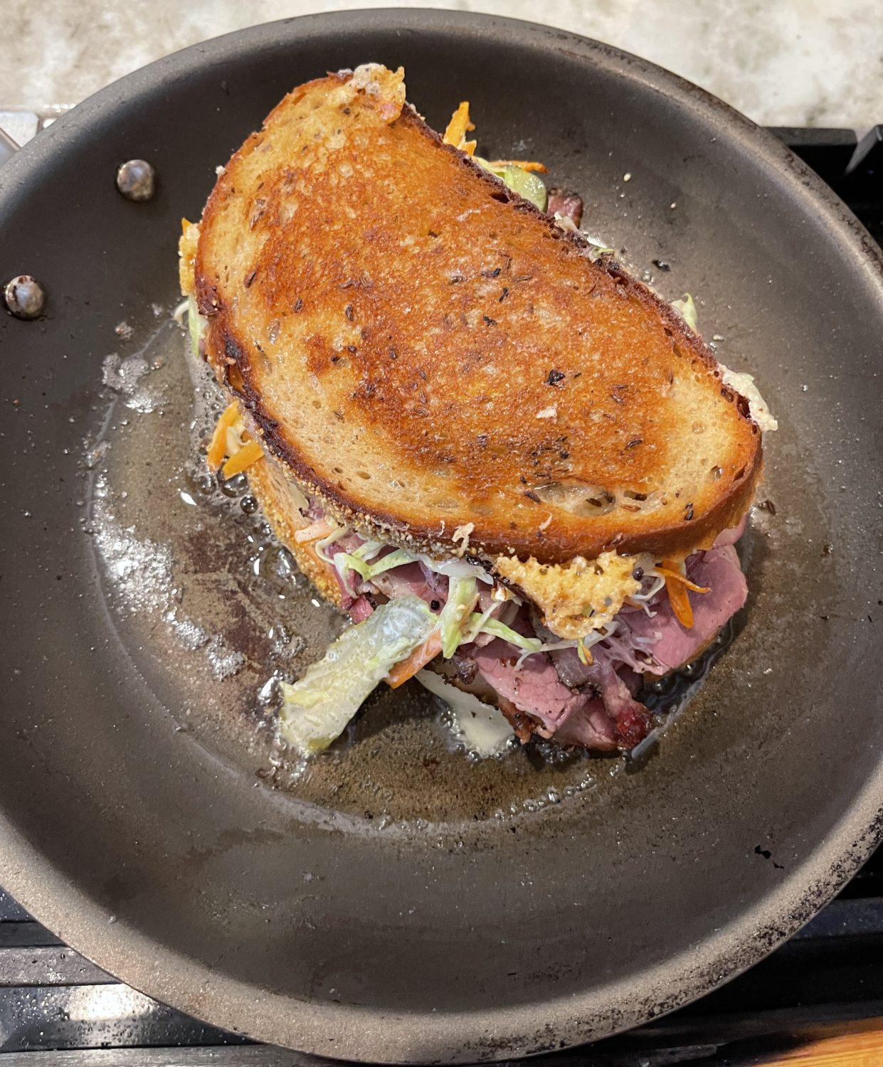 pastrami sandwich in a pan