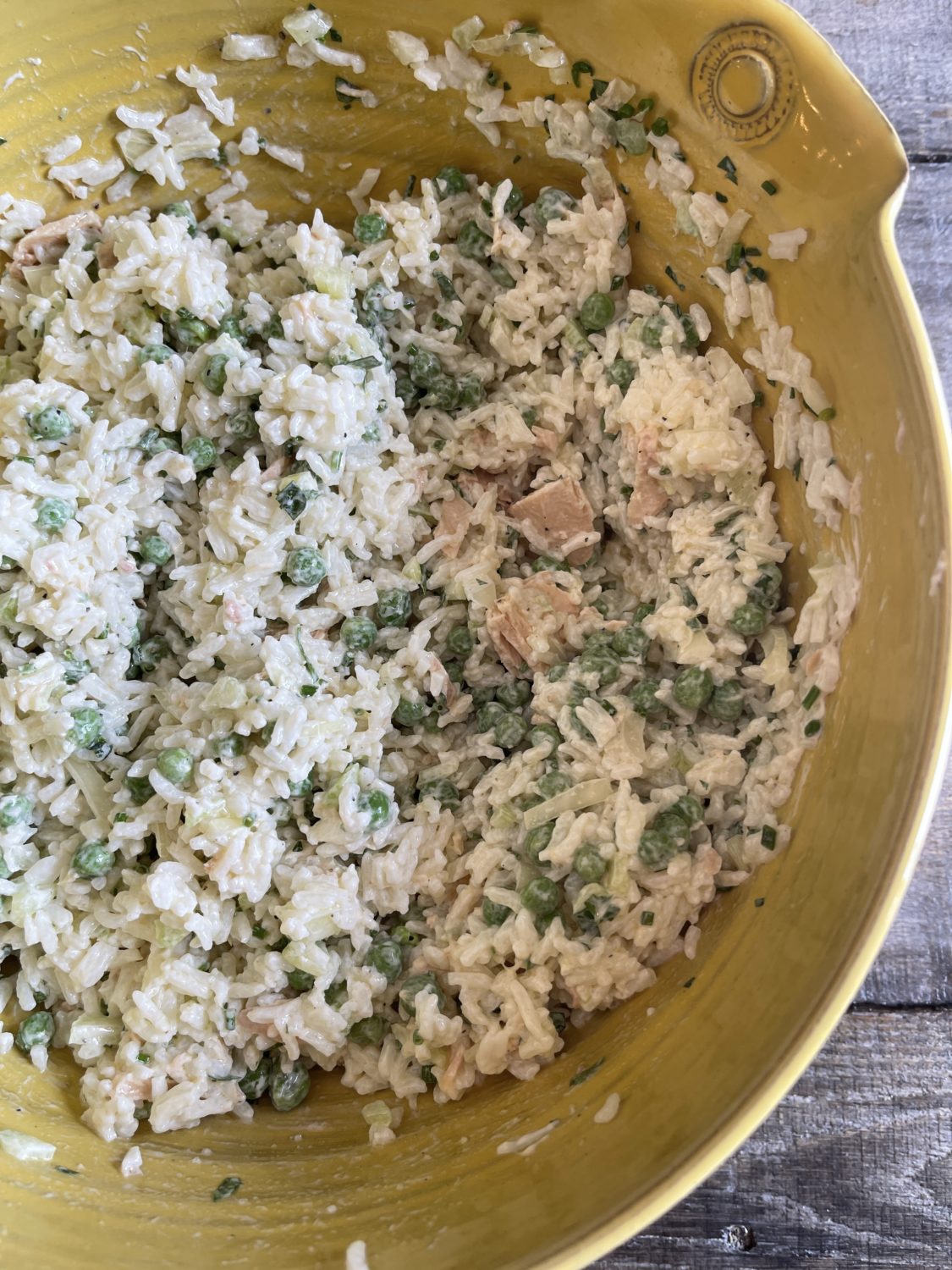 tuna rice salad overhead in yellow bowl