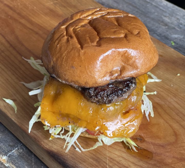 burger on a cutting board