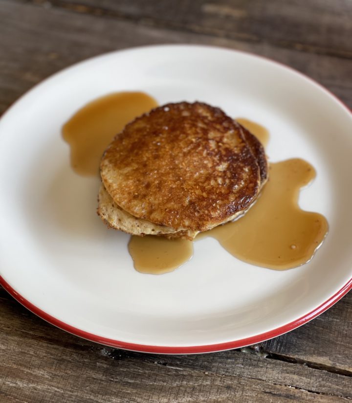 Pancakes on a plate with syrup