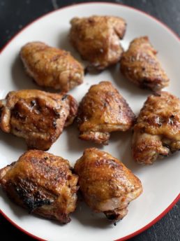 chicken thighs on a platter