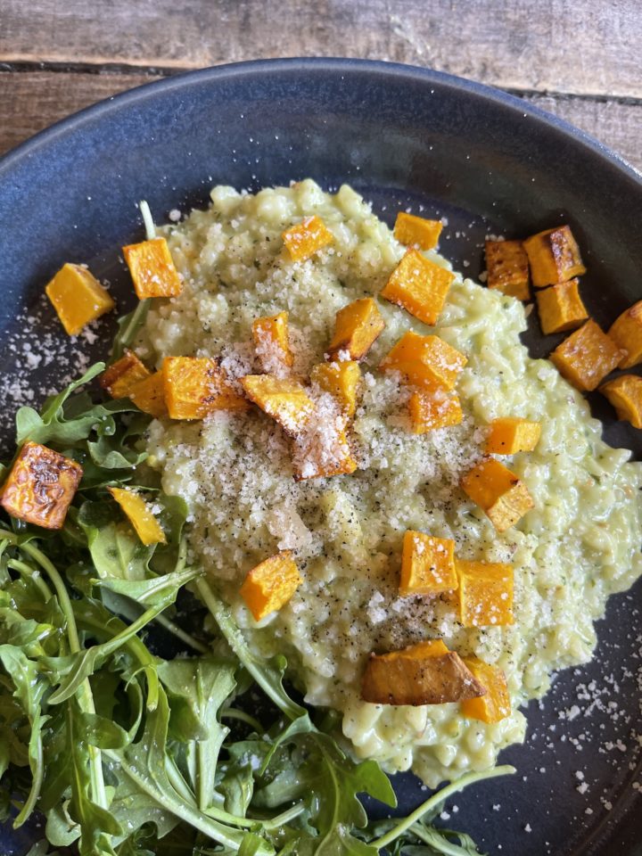 close up on pesto fall risotto with butternut squash