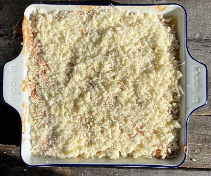 lasagna in a baking dish ready to bake
