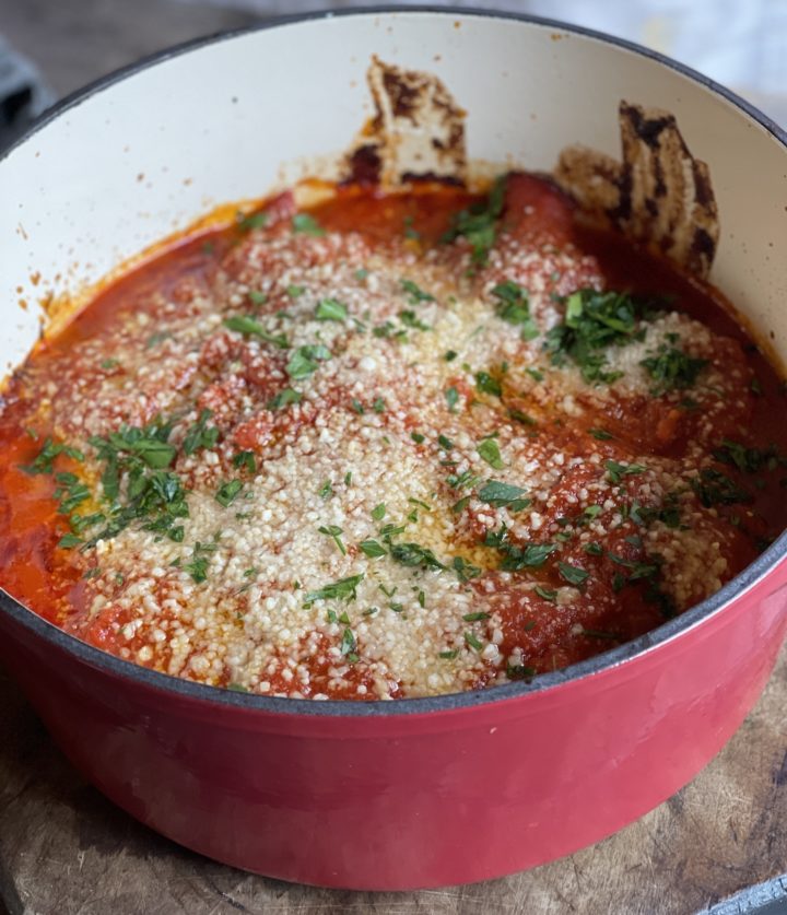 meatballs with parmesan and parsley in a dutch oven