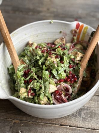 Pomegranate Whole30 Chopped Salad in a rainbow bowl