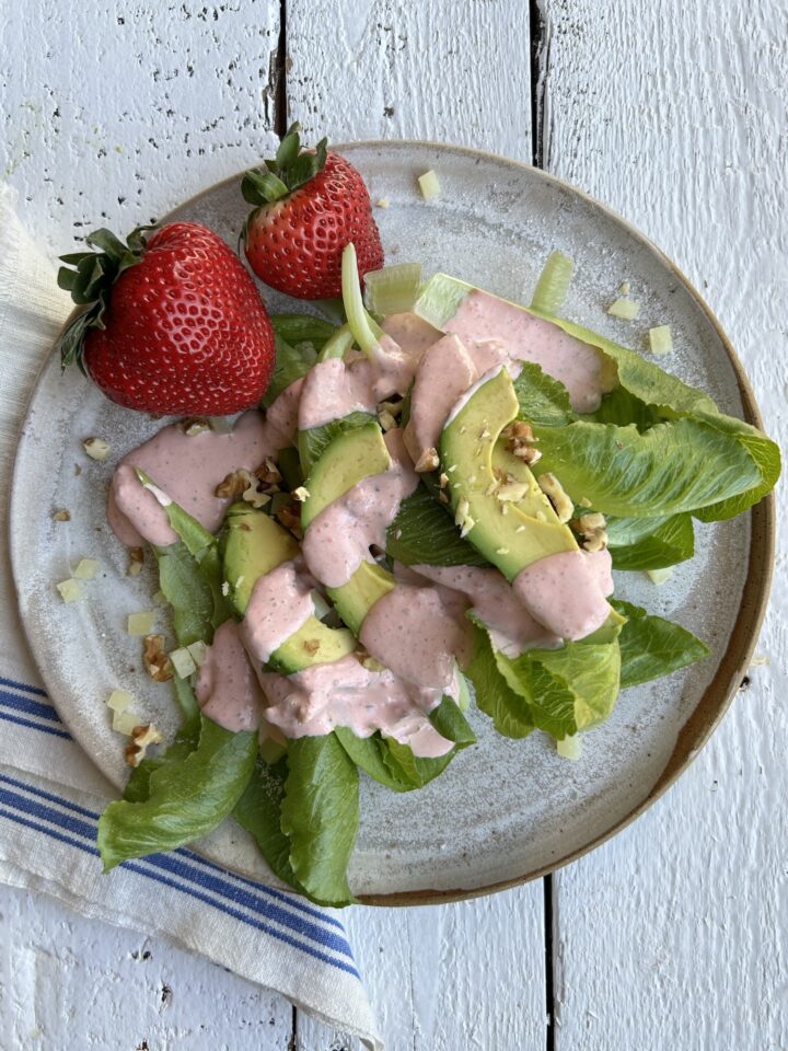 strawberry salad dressing on salad