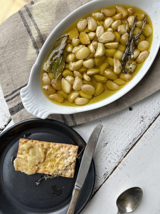 garlic confit smashed on a cracker