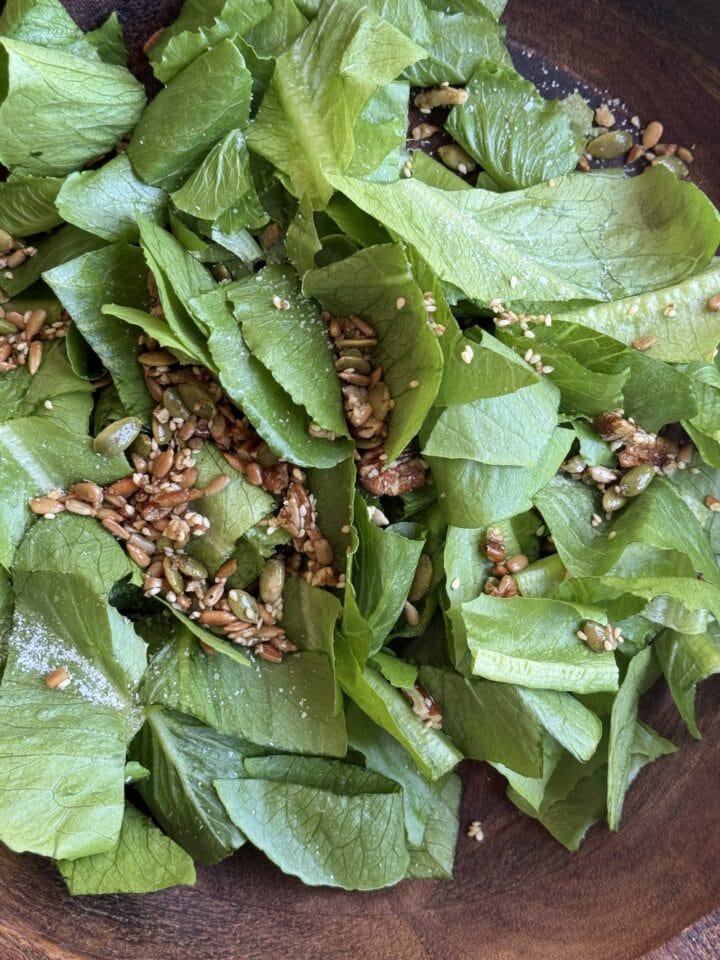 Fresh mixed greens with toasted seeds for healthy salads and meals.