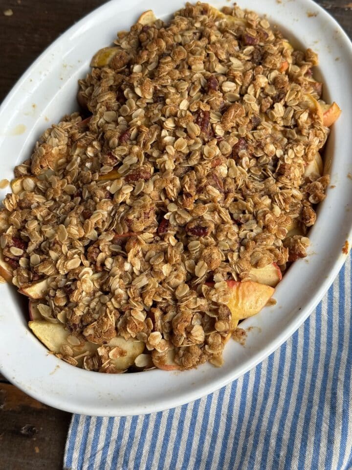 a photo of gluten free apple crumble in a baking dish
