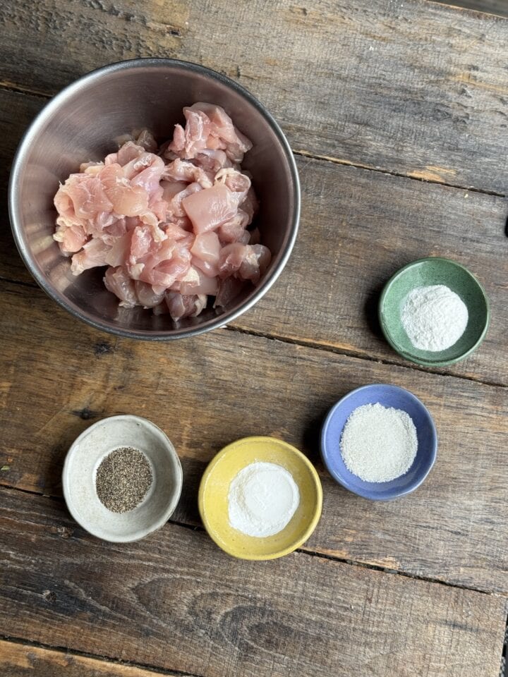 a photo of chicken thighs and spices 