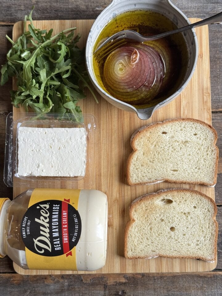 a photo of the ingredients for a leftover turkey sandwich 