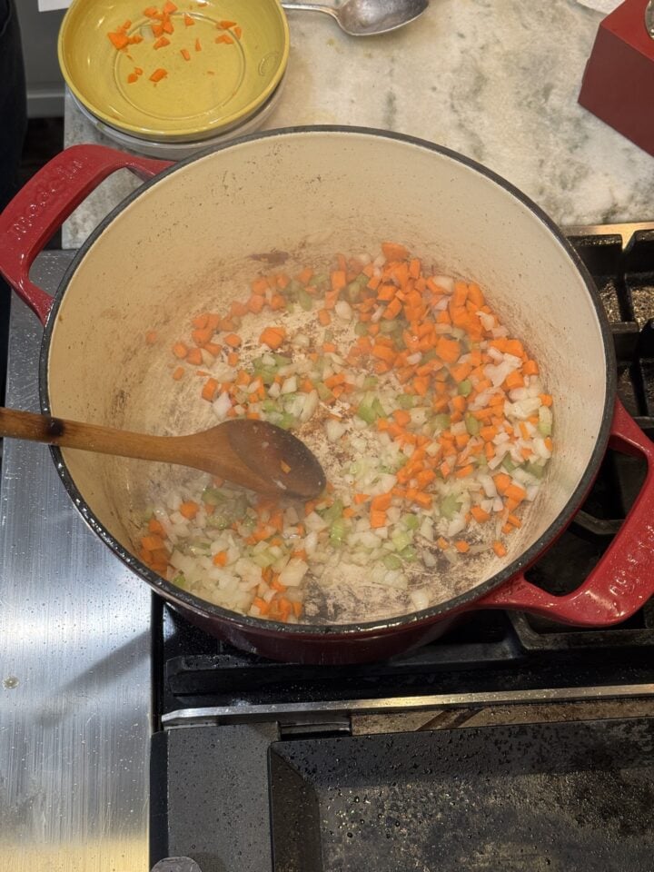 a photo of the mire poix added to the pot