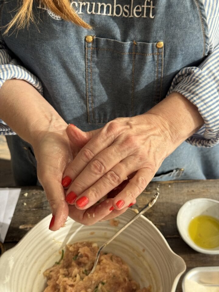 teri forming a chicken meatball in her hands