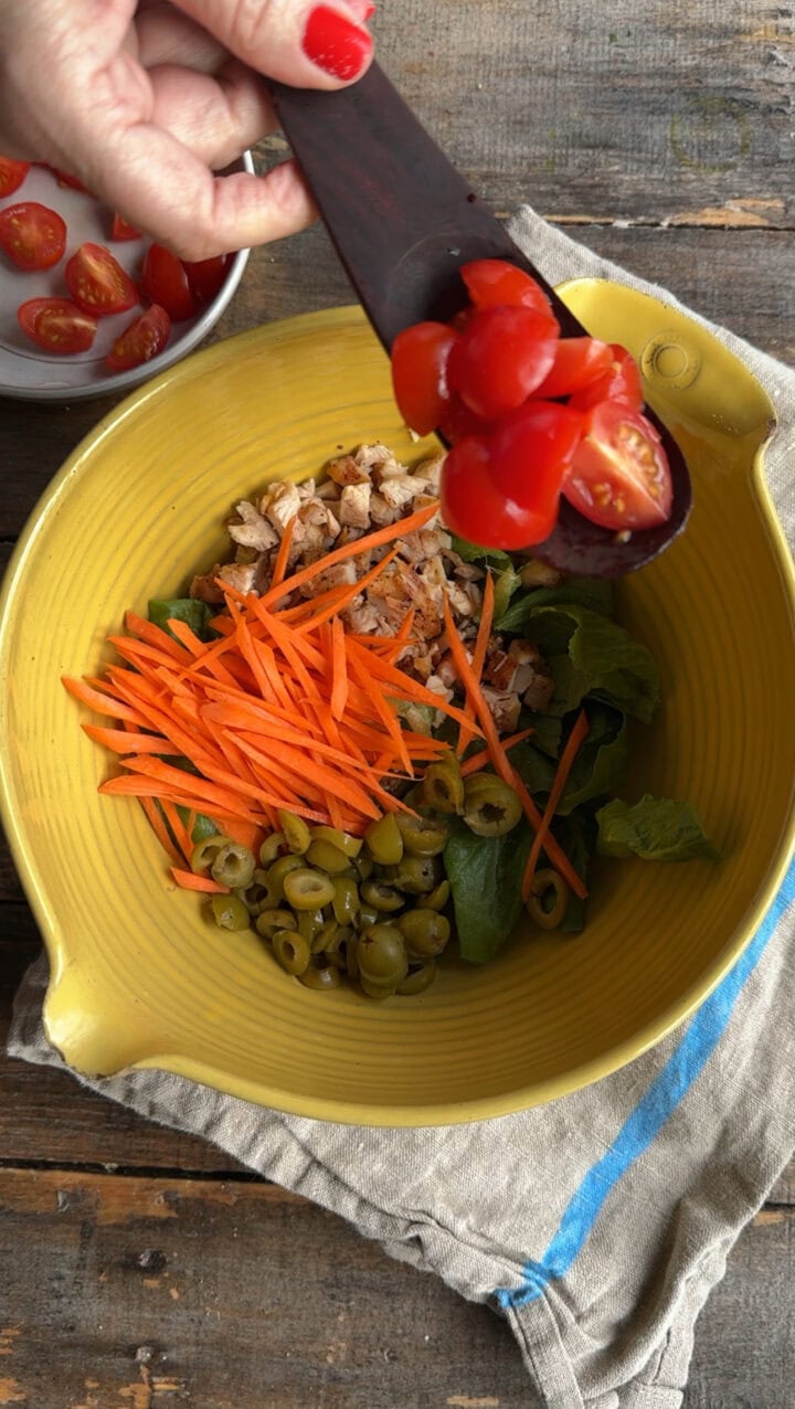 vegetables for buffalo chicken salad in a yellow bowl