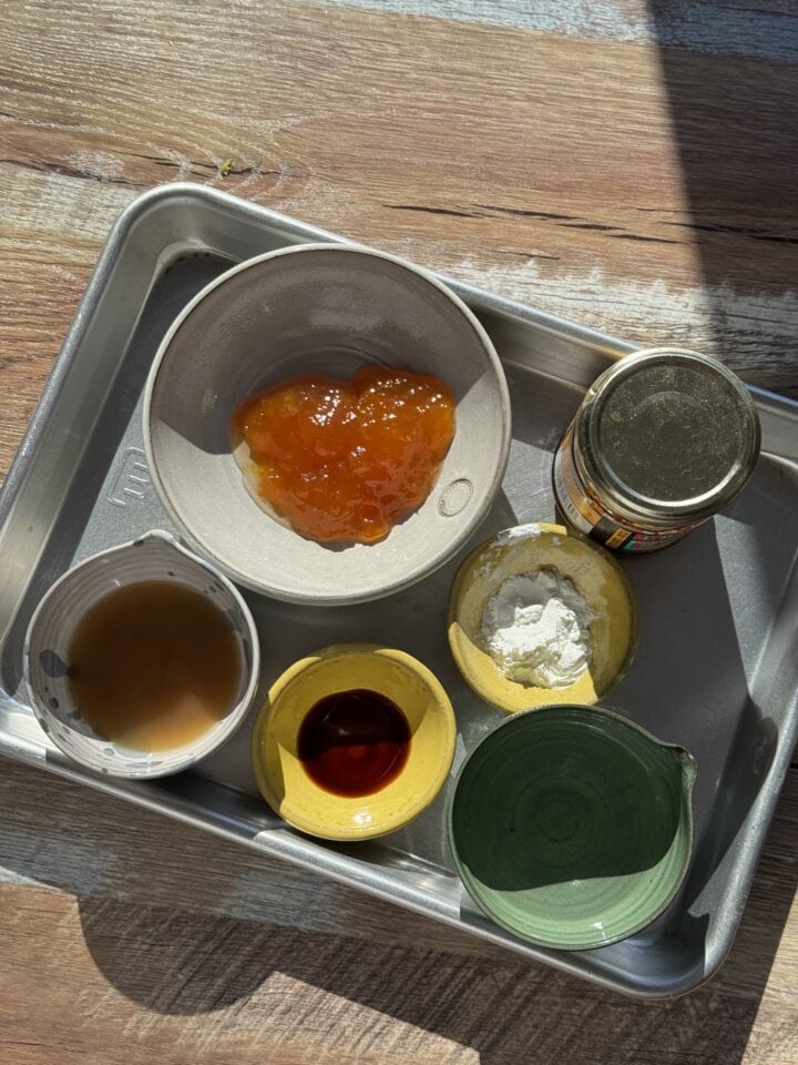 the ingredients for sweet and sour sauce in small bowls