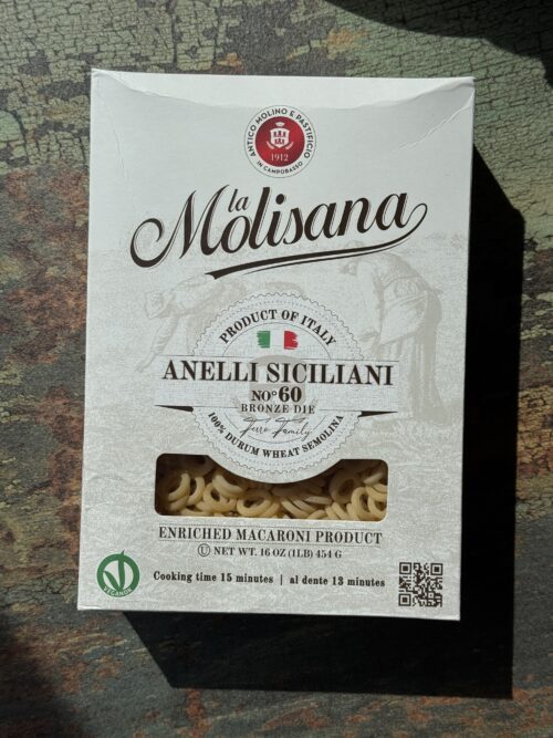 box of pasta on a wooden surface