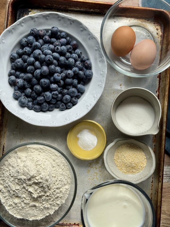 ingredients for blueberry waffles in small bowls