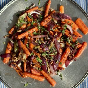 roasted carrot salad on a metal platter