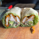 high protein lettuce wrap with crispy baked chicken fingers and cottage cheese herb sauce