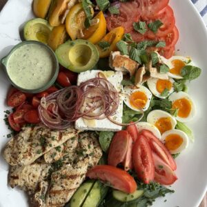 mediterranean chicken salad on a white platter