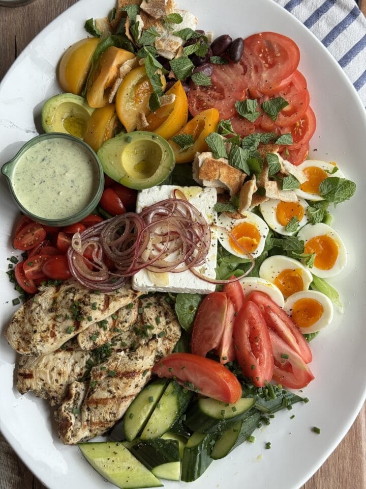 mediterranean chicken salad on a white platter