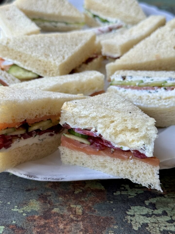 cucumber sandwiches on a white plate