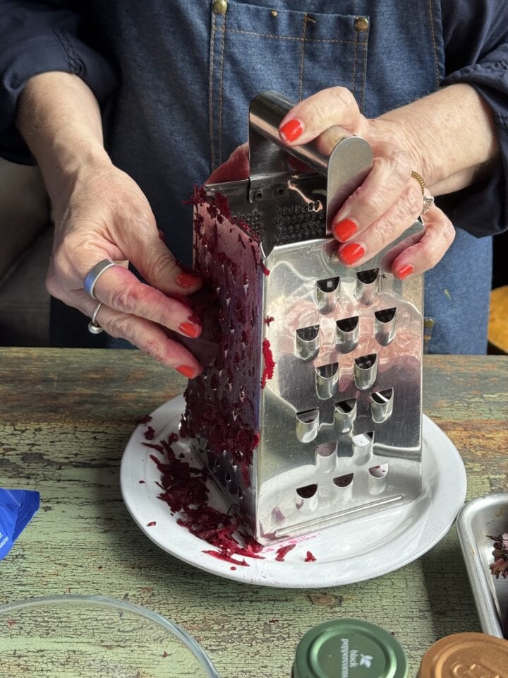 teri grating beets on a box grater