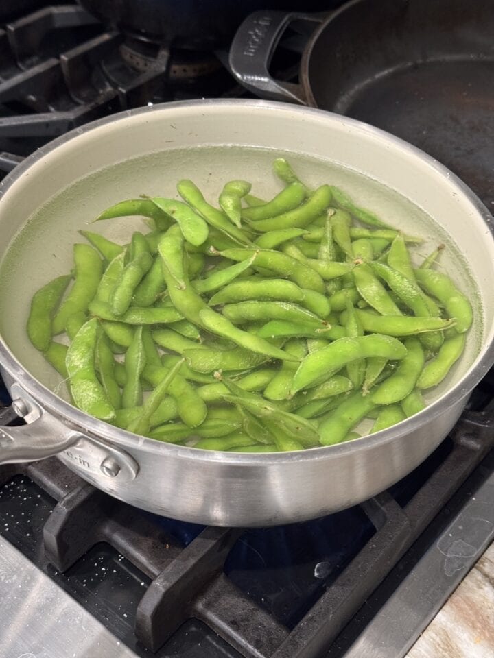 edamame in a pot of water