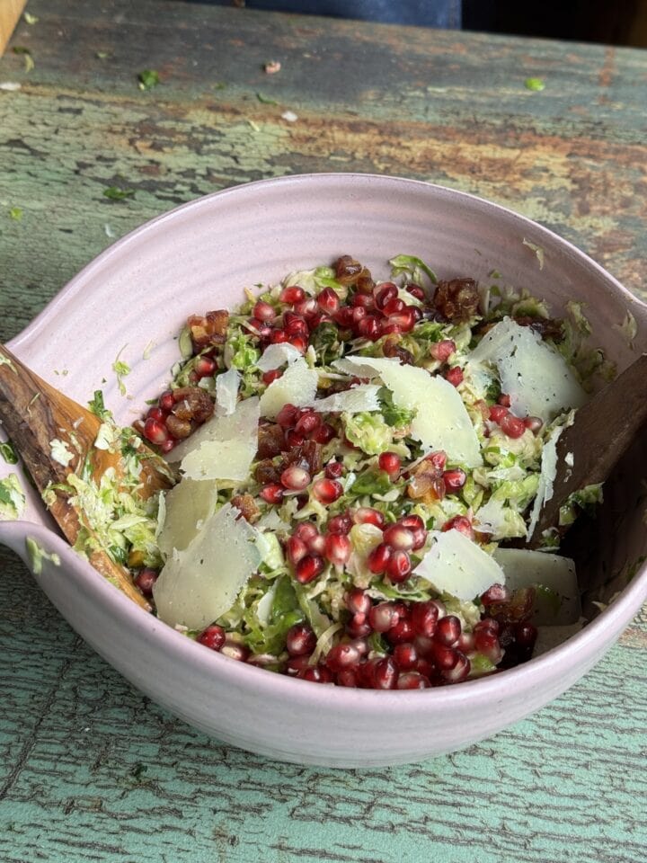 shaved brussels sprout salad with shaved manchego on top