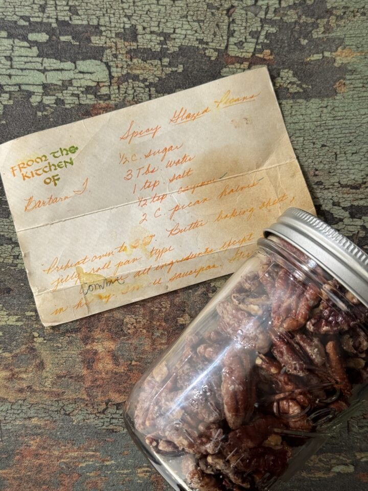 old recipe card next to jar of candied pecans