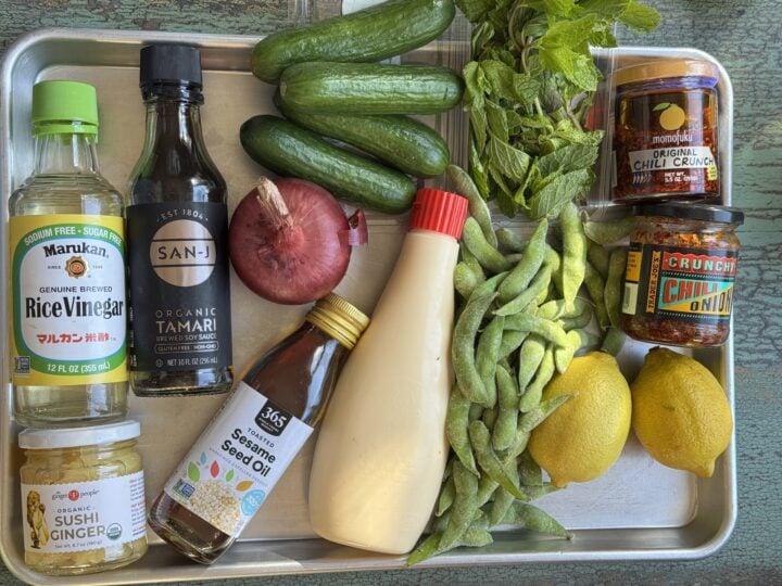 ingredients for soy marinated eggs with poached shrimp salad on a sheet pan