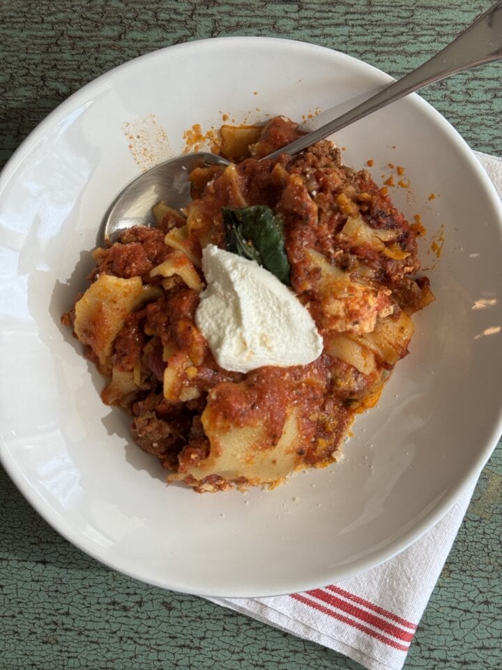 a single serving of one pot lasagna with ricotta on top