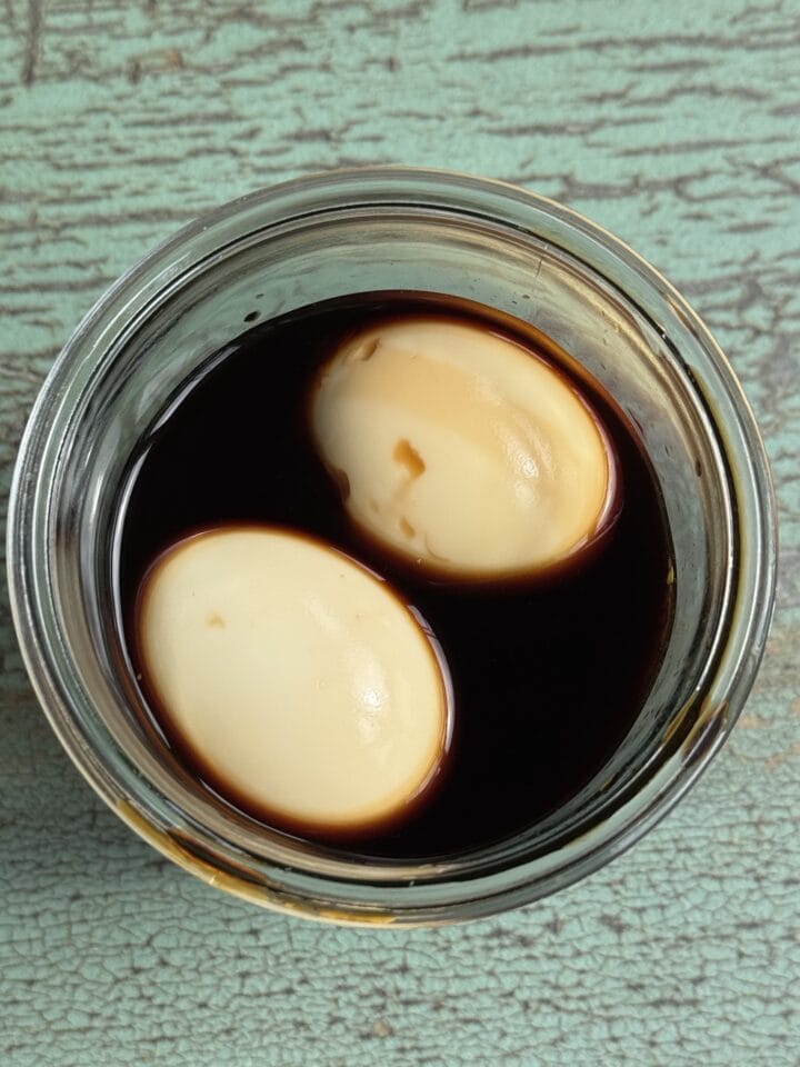 eggs marinating in a soy mixture