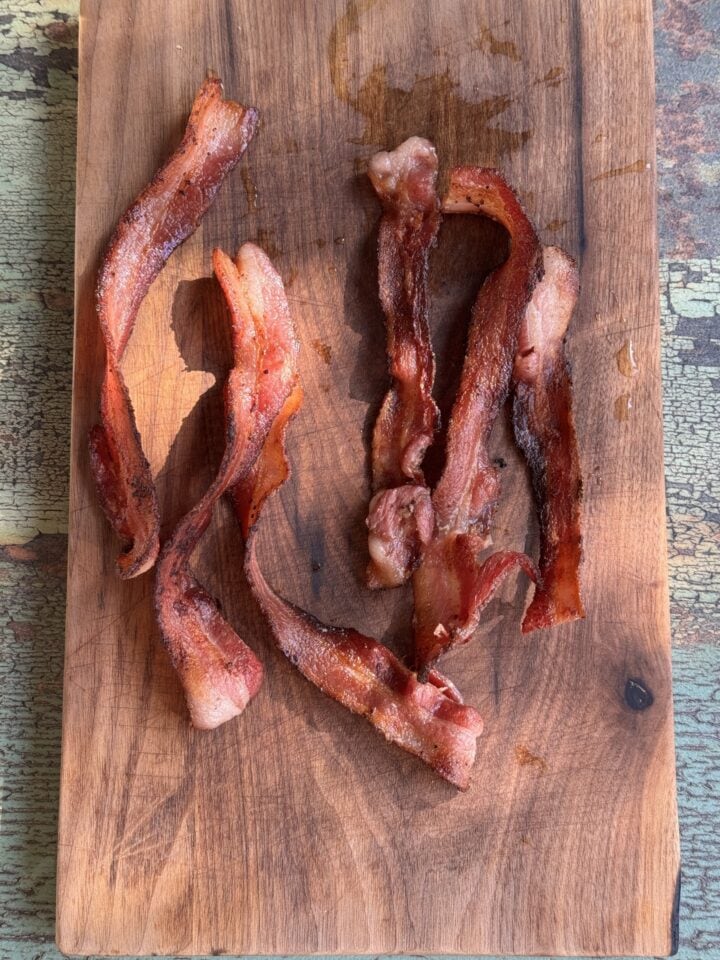 crispy bacon on a cutting board